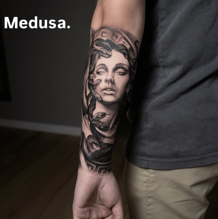 Black-and-grey Medusa forearm tattoo by Lucas Macauley